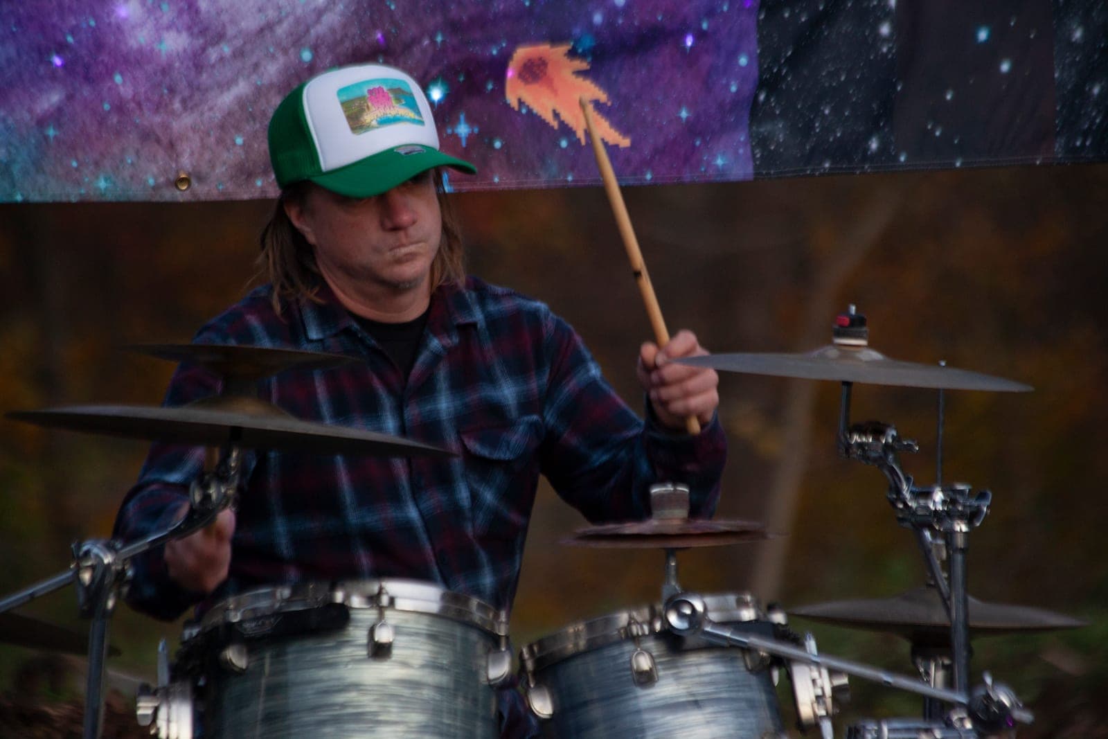 Orbitals drummer mid-fill behind the kit