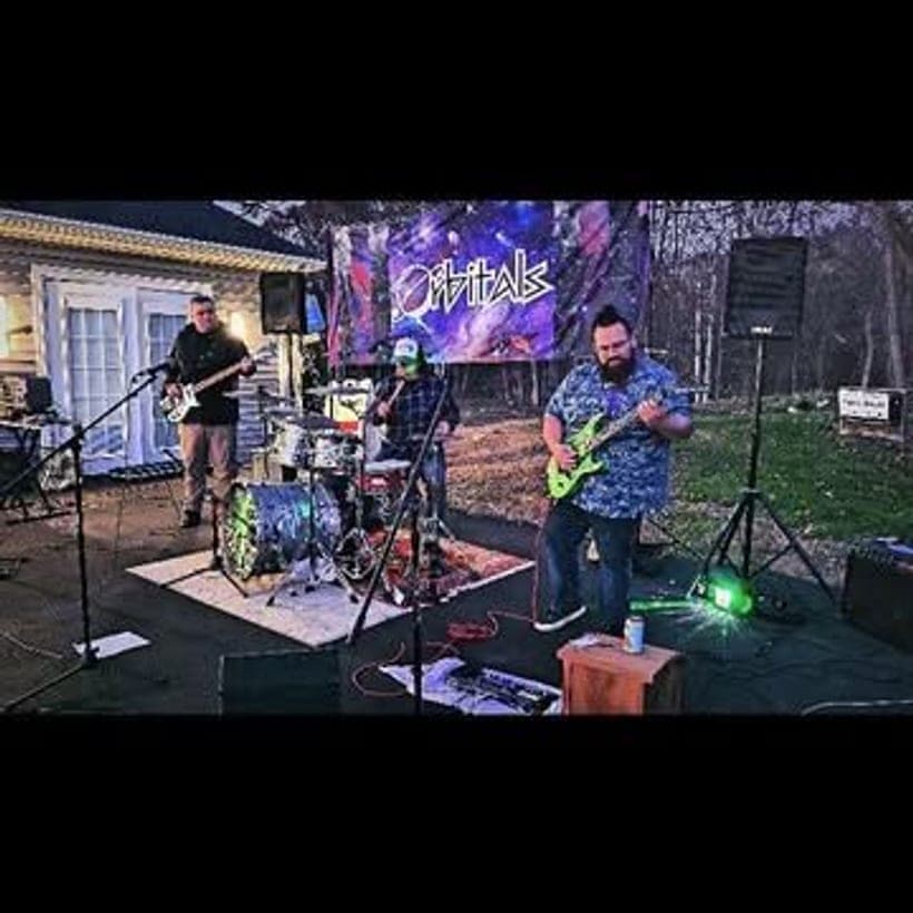 Orbitals on an outdoor stage at dusk